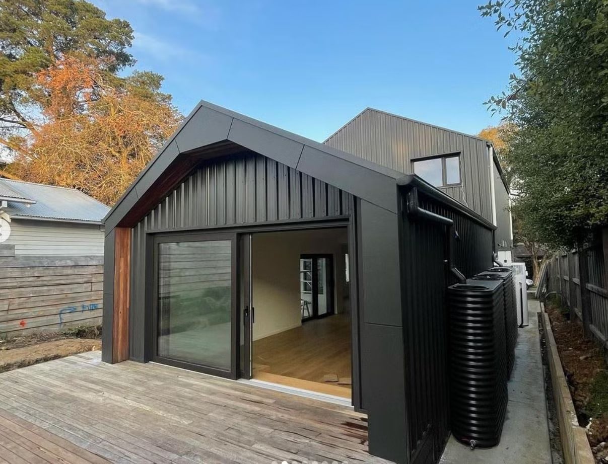 Ceylon black lift and slide door in black painted house