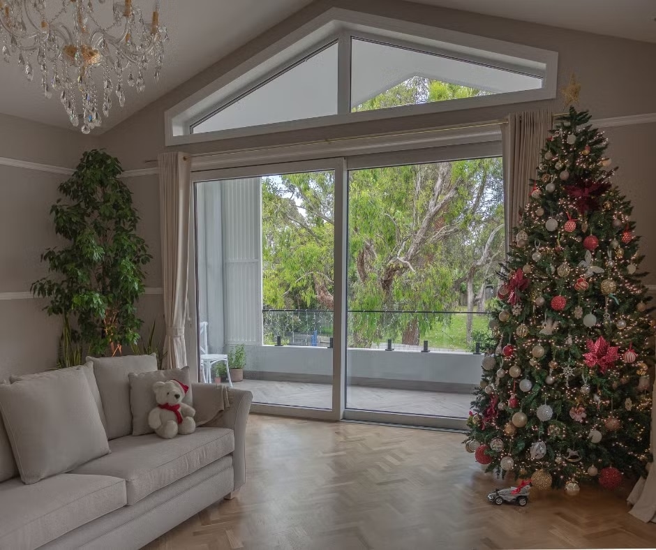 White coloured lift and slide door and triangle shape butt joint fixed window