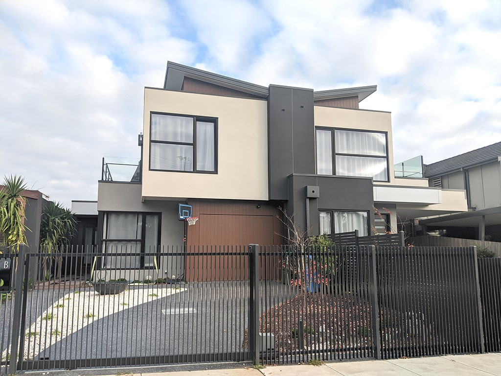 Black brown coloured tilt and turn windows of the passive house