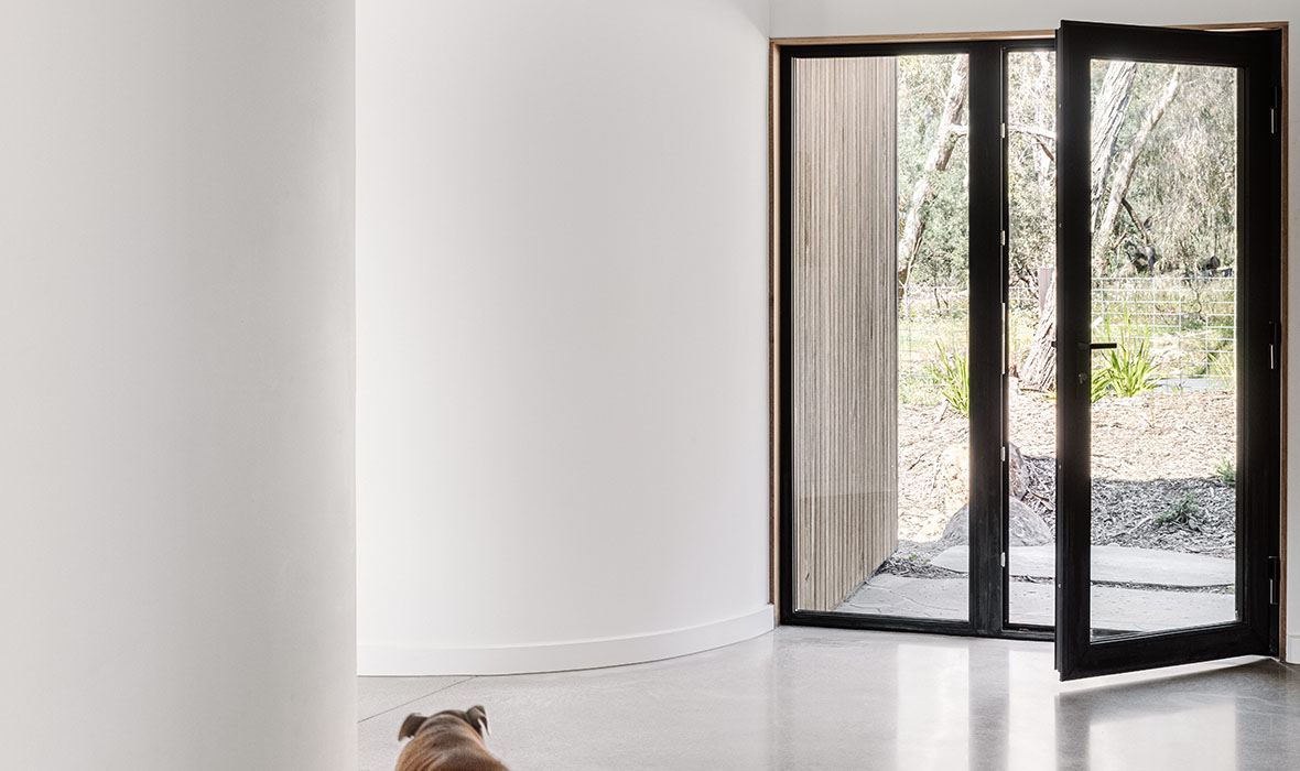 Kyneton Passive House Smooth Black Hinged Door