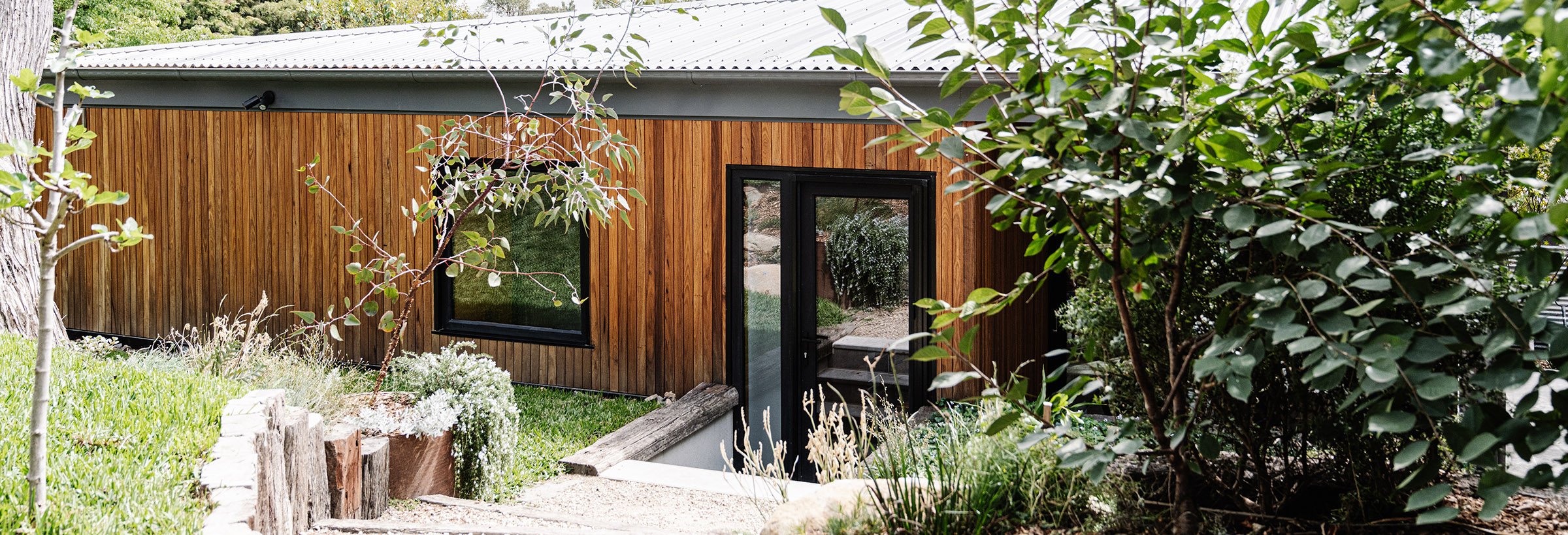 Beautiful Black Entry Door of a passive house in Yarra St