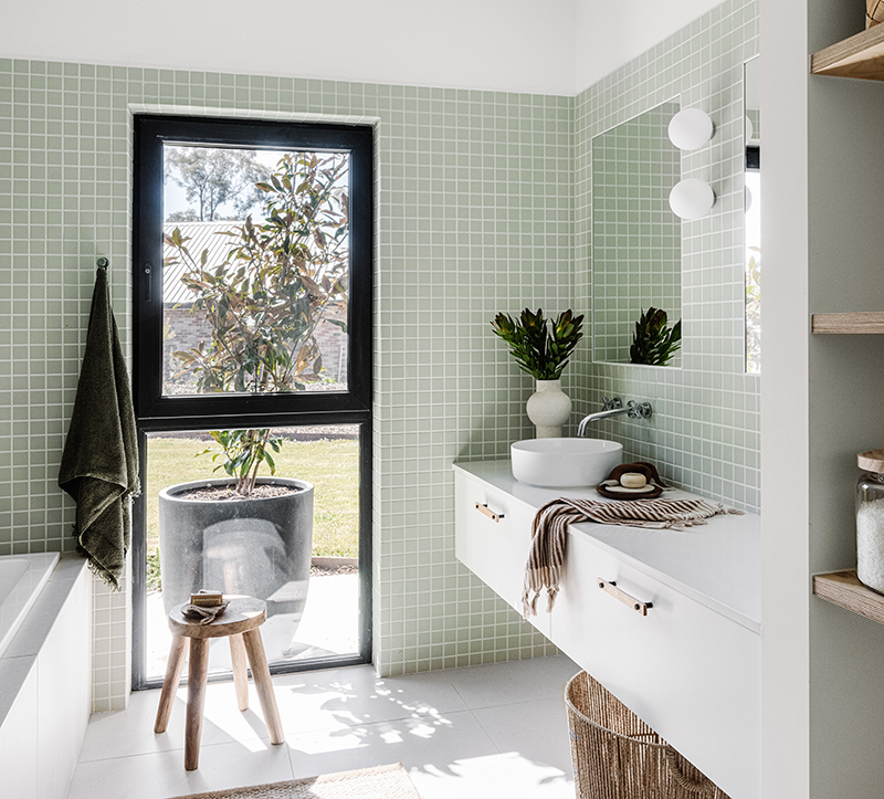 Smooth Black Tilt and Turn window in bathroom of a passive house in Kyneton Taungurung