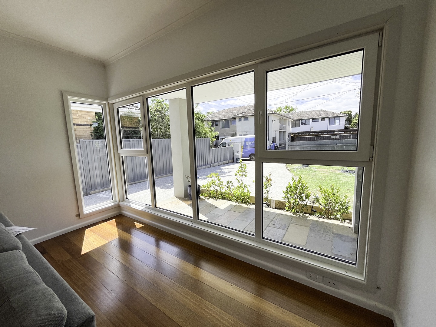 Five panel tilt and turn windows in living room